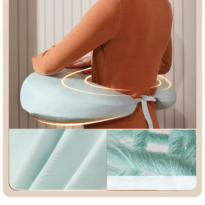 Coussin pour nouveau-ne ergonomique avec sangle de maintien autour de la taille, tissu doux et respirant, soutien optimal pendant l’allaitement.