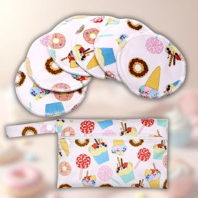 Coussinets d’allaitement Douceur Gourmande™ aux motifs sucrés, parfaits pour un allaitement joyeux et coloré.