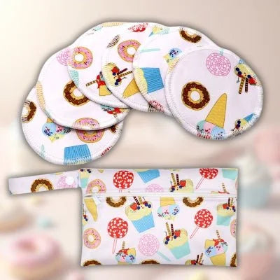 Coussinets d’allaitement Douceur Gourmande™ aux motifs sucrés, parfaits pour un allaitement joyeux et coloré.