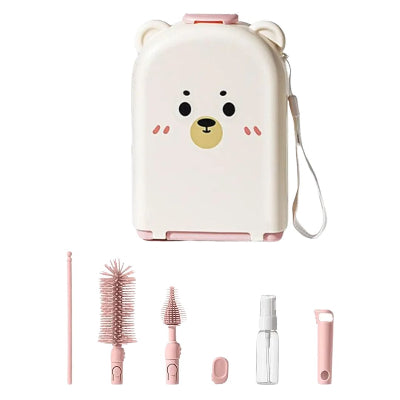 Version rose du goupillon biberon SoftTétin™ avec étui ourson et accessoires complets, adaptés à tous les besoins de nettoyage bébé.