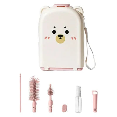 Version rose du goupillon biberon SoftTétin™ avec étui ourson et accessoires complets, adaptés à tous les besoins de nettoyage bébé.