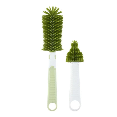 Goupillon pour biberon vert en silicone avec grande brosse et mini goupillon intégré, pratique pour un nettoyage complet des biberons et tétines.