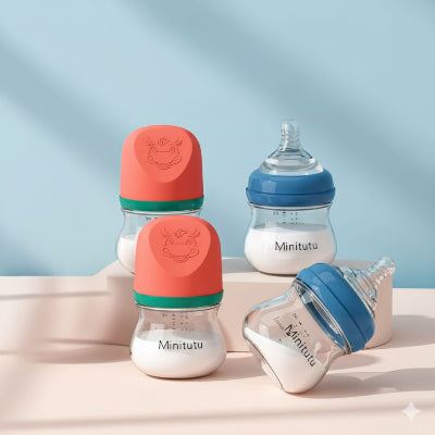 Lot de 4 biberons en verre avec système anti-colique, tétine physiologique souple et bouchons colorés — parfaits pour l’allaitement mixte et les repas de bébé en toute sérénité.