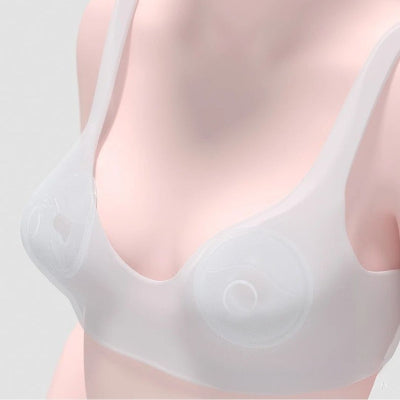 Recueil lait porté sous une brassière d’allaitement, invisible et confortable, permettant aux mamans de bouger librement sans fuite.