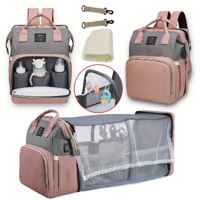  Sac à langer Nomade PeacePod pour les moments en famille en extérieur, parfait pour installer bébé confortablement partout.