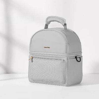 Zoom sur le compartiment intérieur du sac isotherme Bebe, doublé de papier aluminium pour un maintien optimal de la température.

