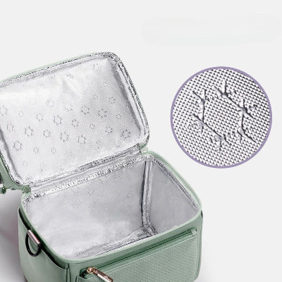 Zoom sur le compartiment intérieur du sac isotherme Bebe, doublé de papier aluminium pour un maintien optimal de la température.