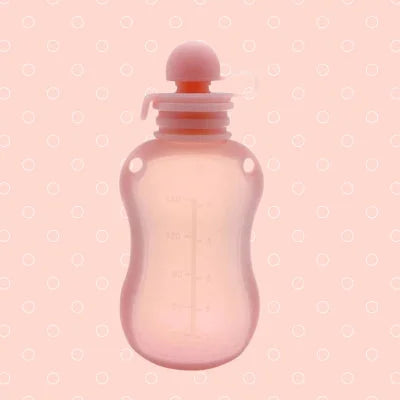 Sachet conservation lait maternel rose en silicone alimentaire, réutilisable, souple et parfait pour l’allaitement à la maison ou en crèche.

