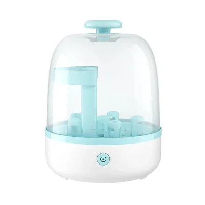 Stérilisateur biberon au design épuré bleu et blanc, avec couvercle transparent et bouton d’allumage central.

