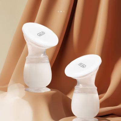 Tire lait Manuel avec couvercle blanc, idéal pour une collecte discrète du lait maternel.