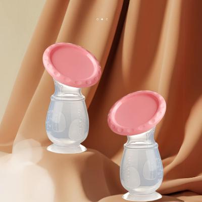 Tire lait Manuel avec couvercle rose, idéal pour une collecte discrète du lait maternel.