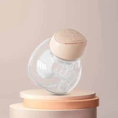 Tire lait au design compact et élégant, posé sur un socle moderne. Conçu pour les mamans recherchant une solution discrète et pratique pour leur allaitement quotidien.
