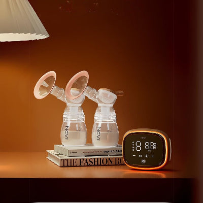 Conception moderne du Tire lait Nuit Sereine pour un tirage discret et confortable, à la maison ou au bureau.