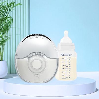 Tire-lait portable avec biberon de lait, parfait pour une utilisation en déplacement.