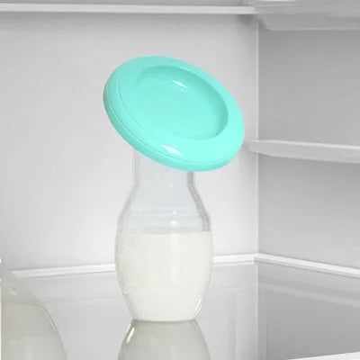 Tire-lait avec couvercle vert pour une conservation optimale du lait maternel
