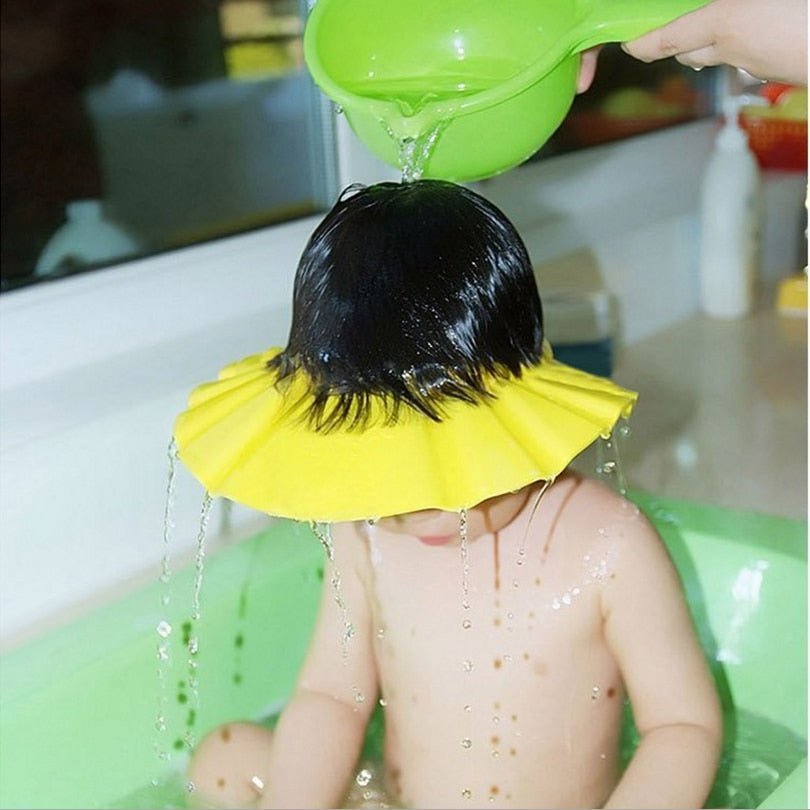 Visière chapeau pour douche bébé I ShampooCap™ - Premiers Pas Sereins